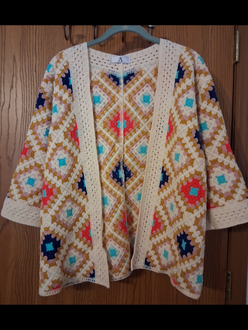 Boutique Az Open-Front Crochet Cardigan in Cream with Multicolor Granny Square